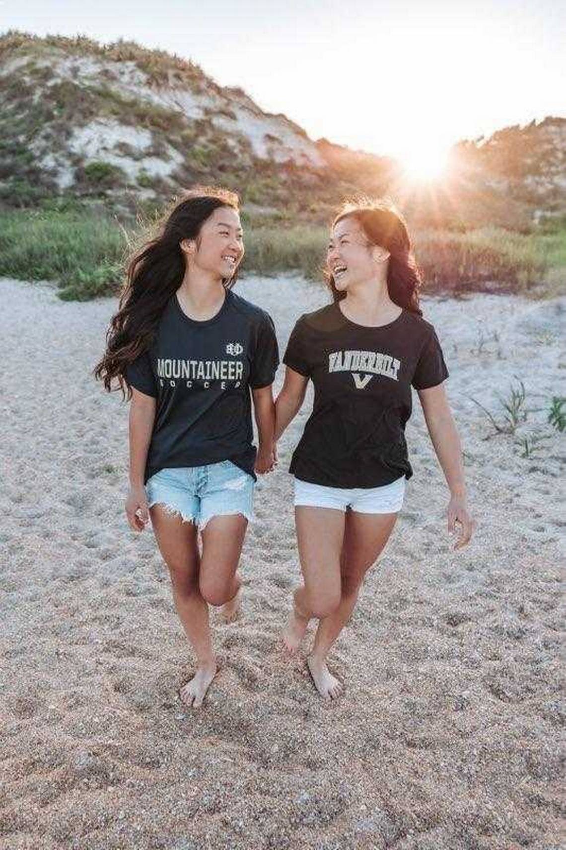 Separated in China, reunited on Good Morning America. Twins graduate top of their class