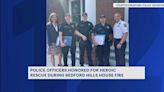 Bedford police officers honored for saving family from house fire