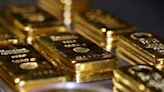 Gold regains some lustre as dollar slides to one-month low