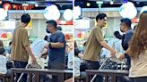 Men shout and argue over baby chair at The Centrepoint food court during lunchtime