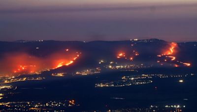 Forest fires blaze in north Israel after rockets launched from Lebanon