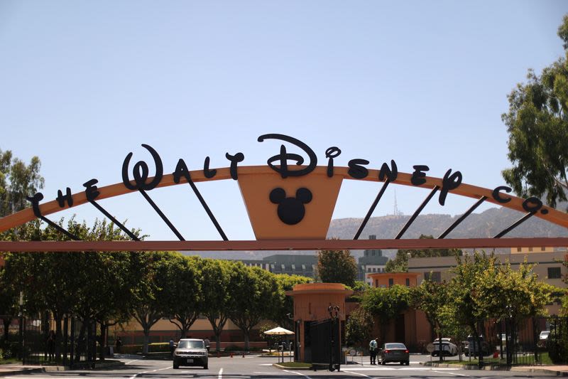 Walt Disney warns theme park revenue to fall, profit slips