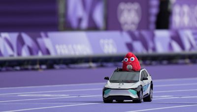 Why are there robot cars at the Olympic track and field stadium?