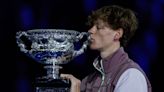 2024 Australian Open champion Jannik Sinner checked his new trophy in as his carry-on