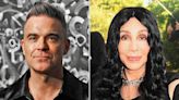 Robbie Williams Was Accidentally 'Rude' to Cher in an Airport by Walking Away Before She 'Finished Talking'