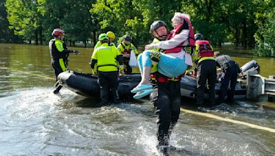 Hundreds are rescued from their homes after Houston area flooding