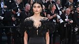 Neelam Gill exudes glamour in a dramatic black feathered gown
