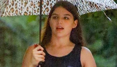 Tom Cruise and Katie Holmes' daughter Suri, 18, braves NYC summer rain