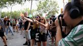 Tourists in Barcelona sprayed with water as overtourism protests escalate