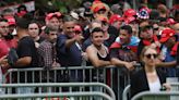 Hundreds of Trump supporters pack Bronx rally as counterprotesters jeer outside