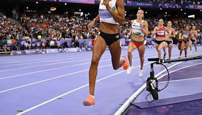 Athletics-Belgian Thiam wins third straight heptathlon gold