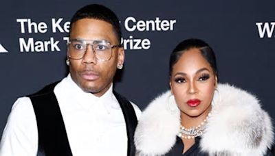 Pregnant Ashanti stuns in black shirt dress and lavish fur vest as she joins boyfriend Nelly at Mark Twain Prize for American Humor gala in DC