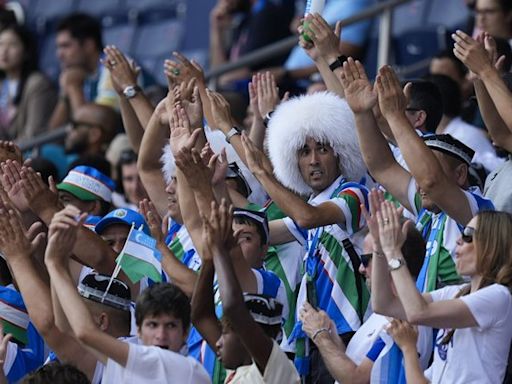 Uzbekistan loses the match but wins over crowd as soccer competition kicks off Paris Olympics