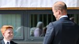 Prince William visits school after boy's invite