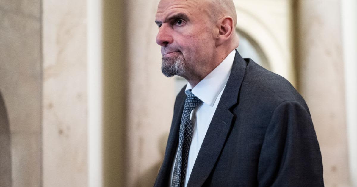 Sen. Fetterman takes off Harvard University hood during commencement speech, gets standing ovation