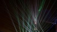 A massive laser show engulfed the Eiffel Tower in a highlight of the Paris Olympics opening ceremony