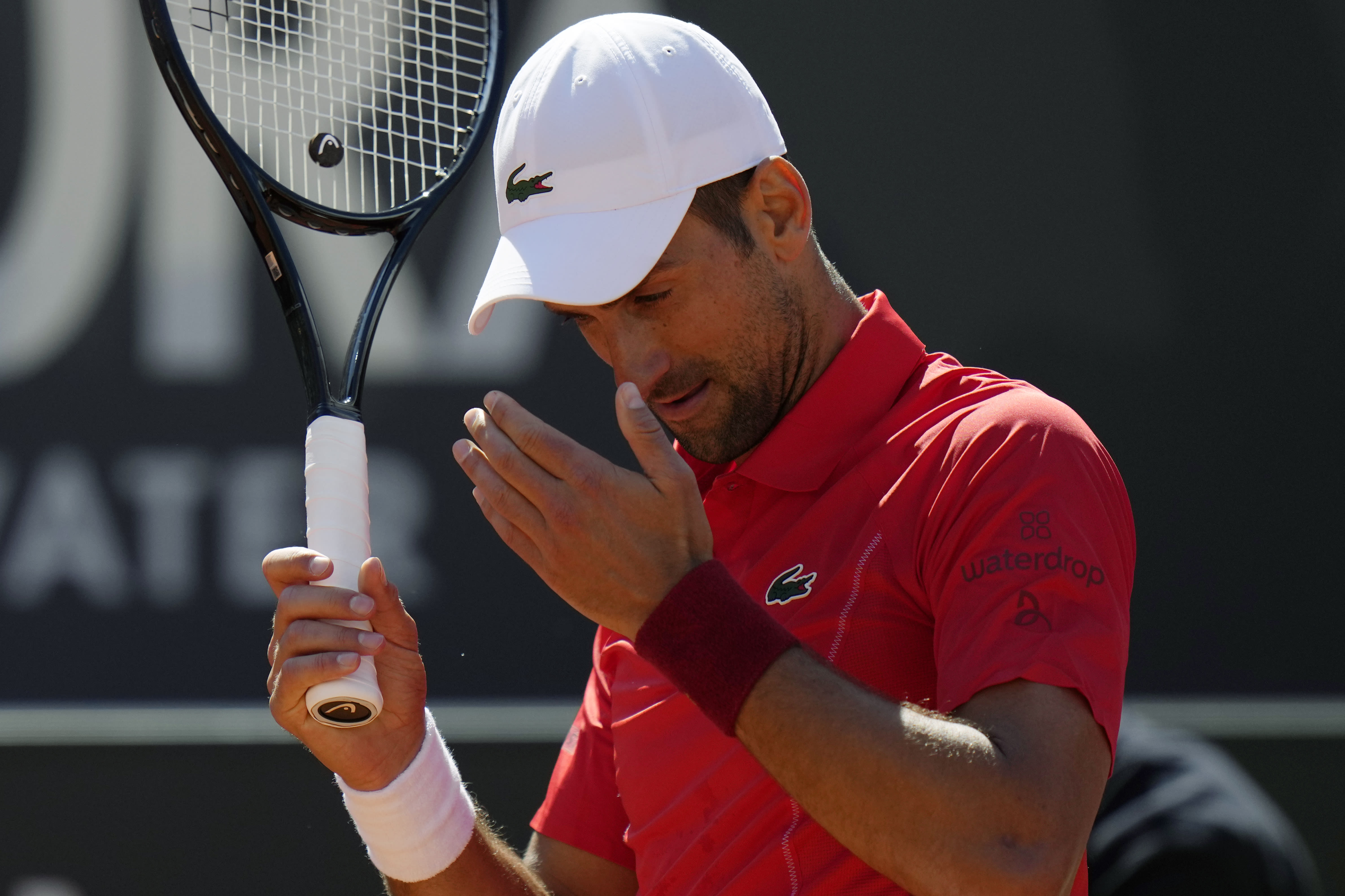 Djokovic follows Nadal to early exit at Italian Open in first match after being hit by water bottle