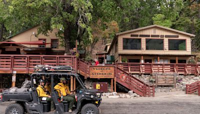 A wildfire is bearing down on a tiny town. And hardly anyone is leaving.