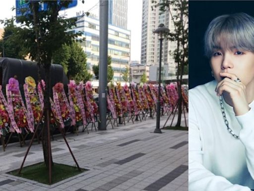 ARMY不滿SUGA涉醉駕影響BTS 逾20花牌圍HYBE要求退團 | am730