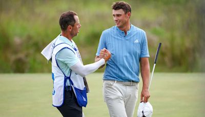 This caddie says he's protective of his rising superstar pro. Here's why