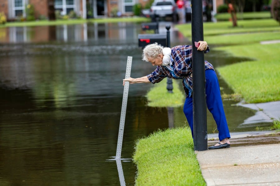 Tropical Storm Debby doles out repeat deluges for weather-weary residents