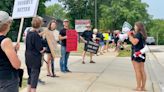 People rallied at two Menomonee Falls schools this week to protest the superintendent search process