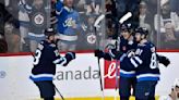 Kyle Connor scores twice as Jets edge Kraken 4-3 to clinch second in the Central Division