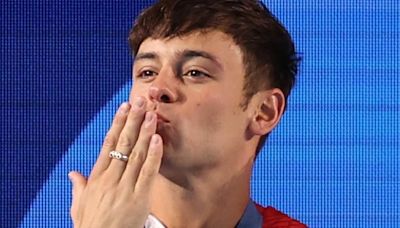 Tom Daley's husband Dustin Lance Black chokes back tears