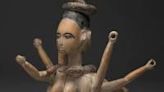 Multi-armed water figure echoes African deities, in turn modeled on Indian iconography