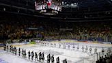 International Ice Hockey Federation to mandate neck guards after the death of a player by skate cut