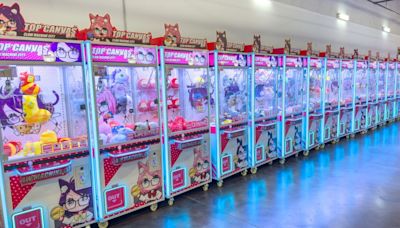 Status Update: The District adds claw machine mecca, Dart Haus and soon simulated racing