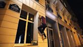 Parkour activists are jumping off buildings to turn off businesses’ lights in Paris during Europe’s energy crisis