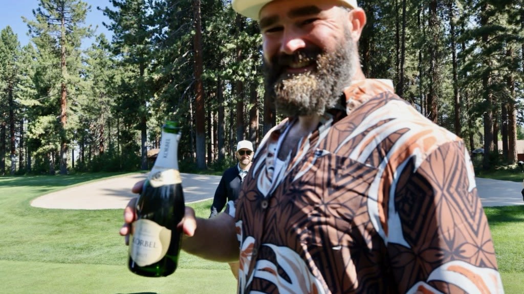 Jason Kelce wins American Century Championship's Long Drive Competition, celebrates with bubbly