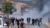 Israeli police clash with Druze protesters in the Golan Heights. The rare violence leaves 20 injured