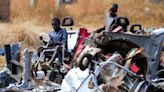 Impoverished Zimbabweans turn to scrap metal trade as inflation bites