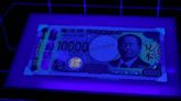 Japan launches banknotes with hologram portraits