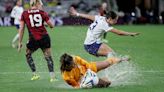Waterlogged pitch causes controversy as US women’s team beats Canada in penalty shootout to reach W Gold Cup final
