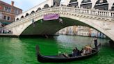 Extinction Rebellion climate activists dye Venice’s Grand Canal green in COP 28 protest