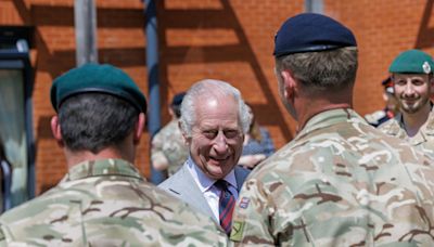 King Charles jokes he’s ‘allowed out of cage’ on royal visit to army barracks after cancer diagnosis