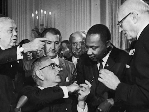 On this day in history, July 2, 1964, President Johnson signs 'sweeping' Civil Rights Act