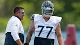 Former Tennessee Titans' Taylor Lewan at season finale, tries to tackle Mike Vrabel pregame