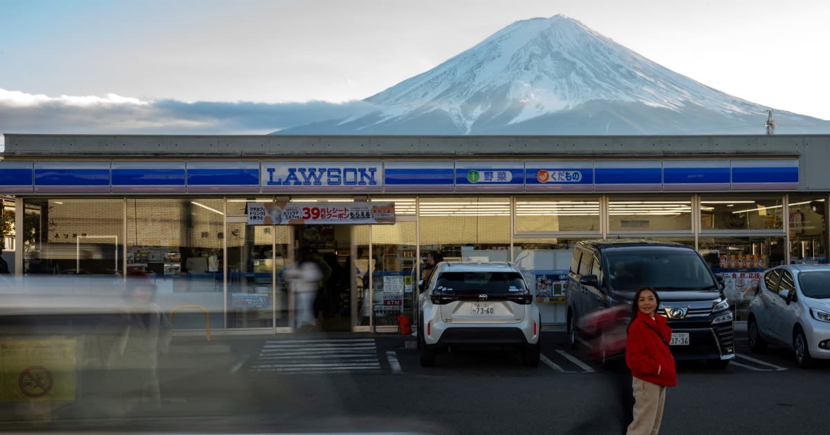 To fend off tourists, a town in Japan is building a big screen blocking the view of Mount Fuji