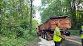 Car-truck crash on Travis Ave. on Staten Island results in fuel spill