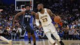 Short-handed Lakers can't keep Magic off glass in losing effort