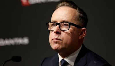 Former Qantas boss exit pay slashed by millions