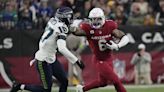 Arizona Cardinals' James Conner carries ball, team to near win vs. Seattle Seahawks