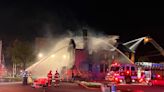 Flames ravage Windsor's abandoned 'rainbow house' on Ouellette in overnight fire