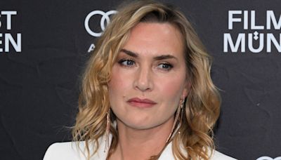 Kate Winslet is a vision in fitted bridal white suit