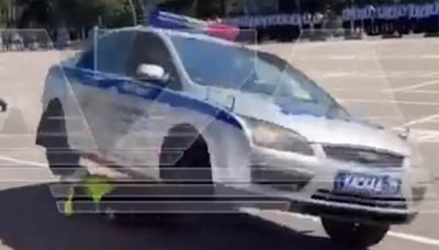 Horrifying moment police car stunt goes horribly wrong