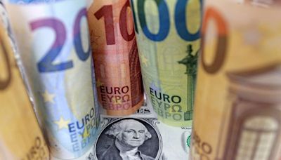 Dollar edges up as traders await rate cut clues, euro dips